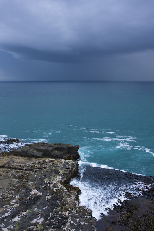 Surf And Storm Cloud